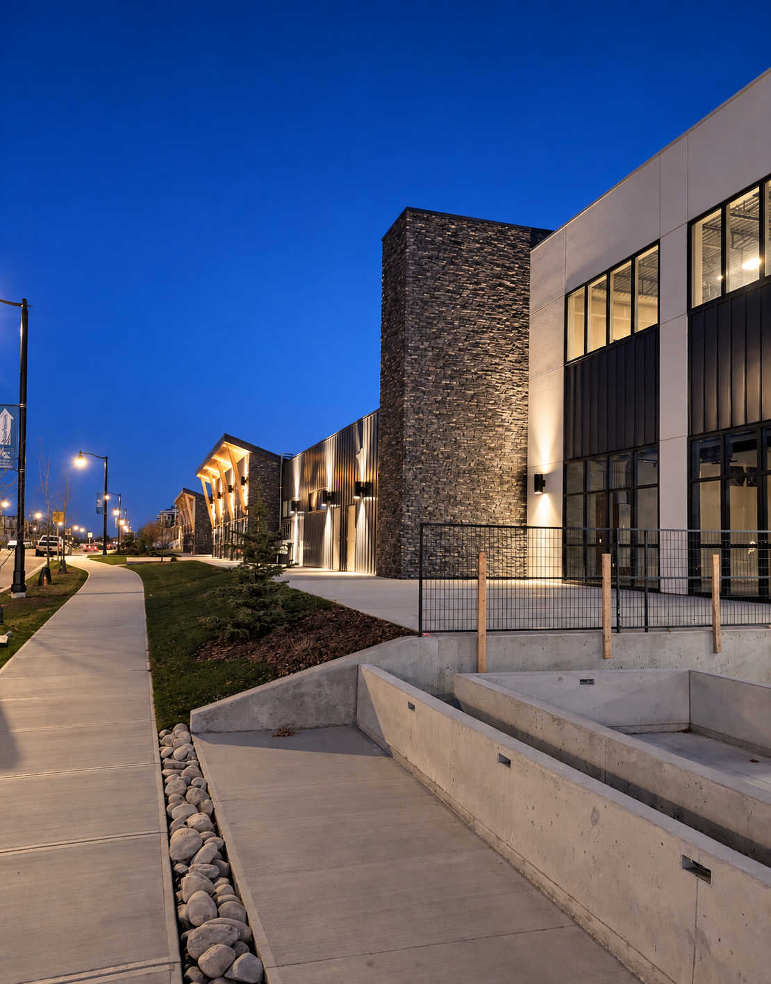 Mall exterior walkway and architectural lighting at blue hour