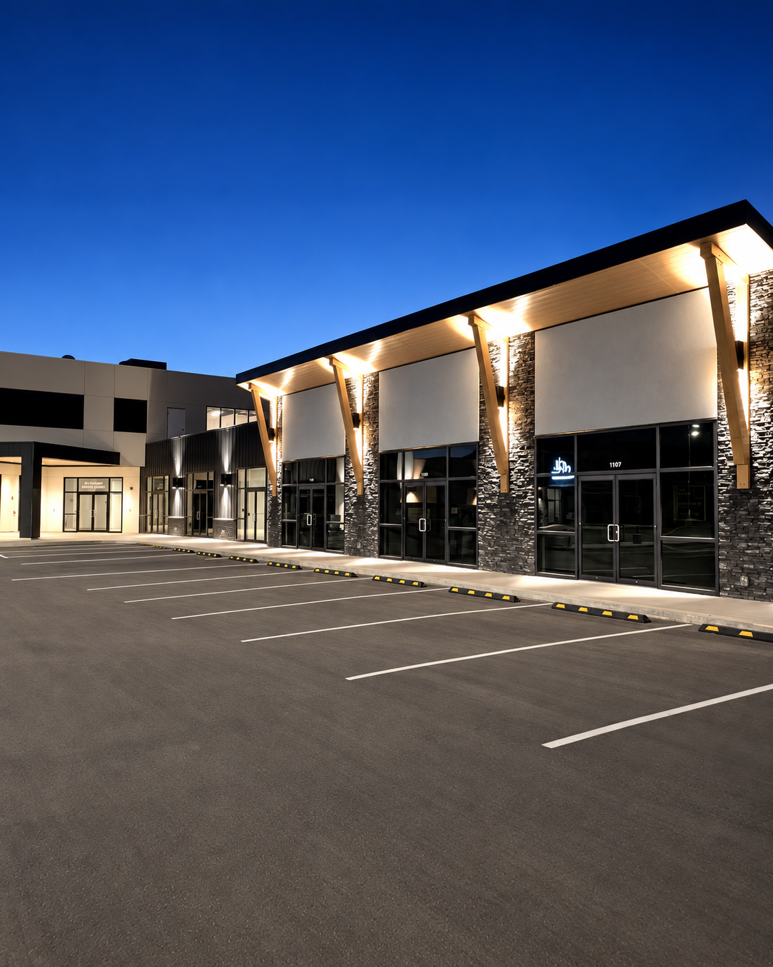 Finished mall storefronts with controlled architectural lighting